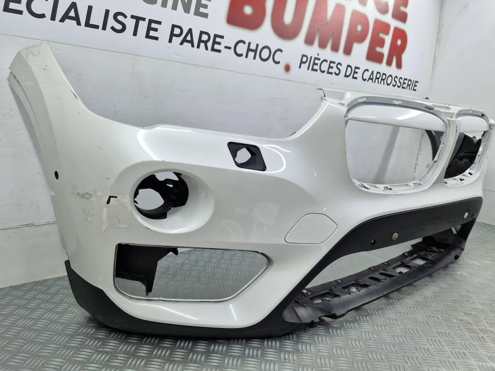 BMW X1 (F48) Első lökhárító 1. fázis (2015.09-től 2020.03-ig) – Eredeti használt alkatrész radarral, fényszórómosóval és p...