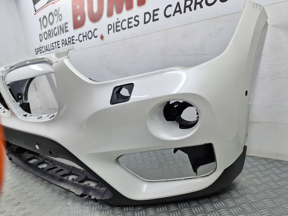BMW X1 (F48) Első lökhárító 1. fázis (2015.09-től 2020.03-ig) – Eredeti használt alkatrész radarral, fényszórómosóval és p...
